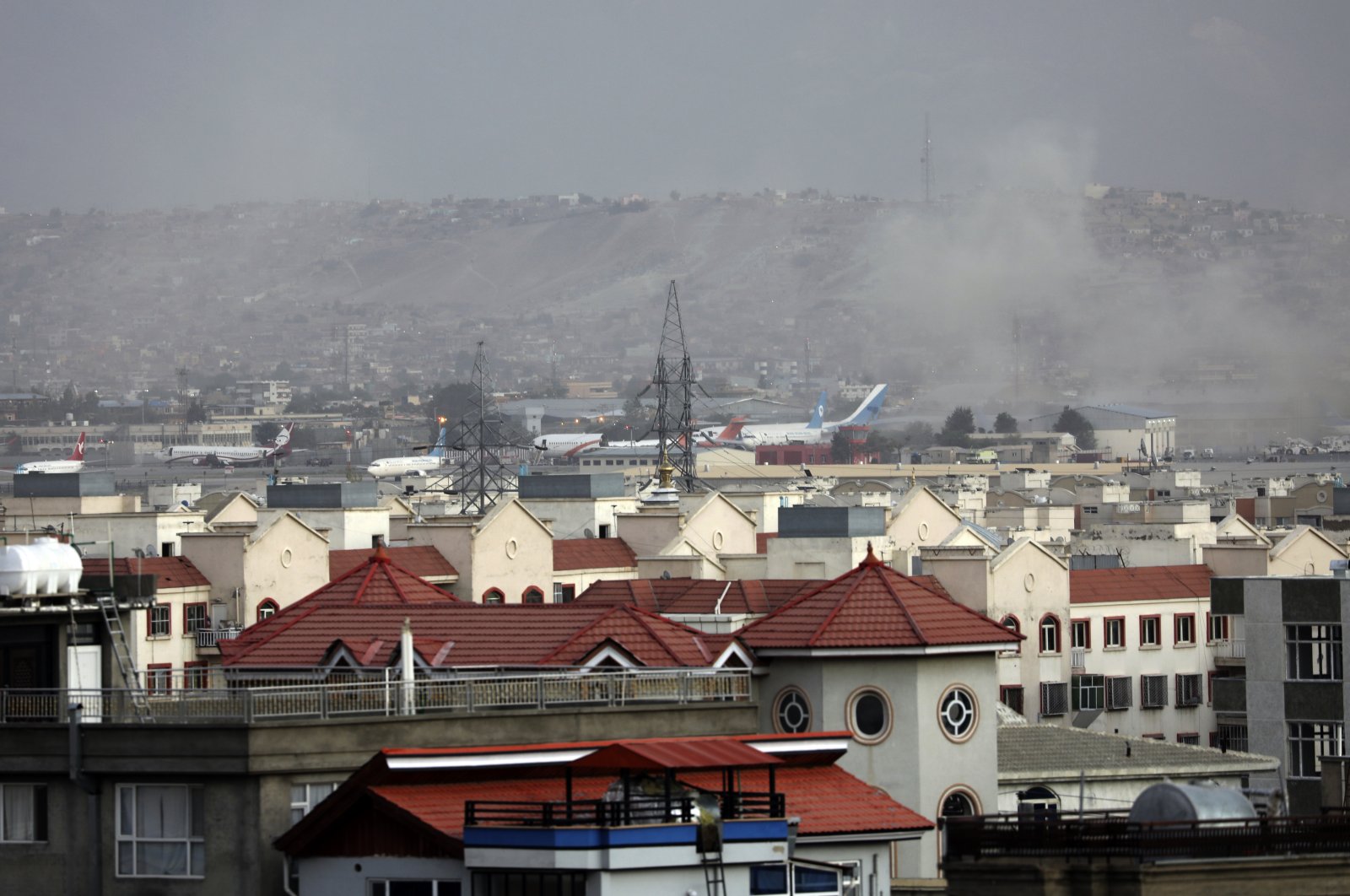 Smoke rises from a deadly explosion outside the airport in Kabul, Afghanistan, Aug. 26, 2021. (AP Photo)