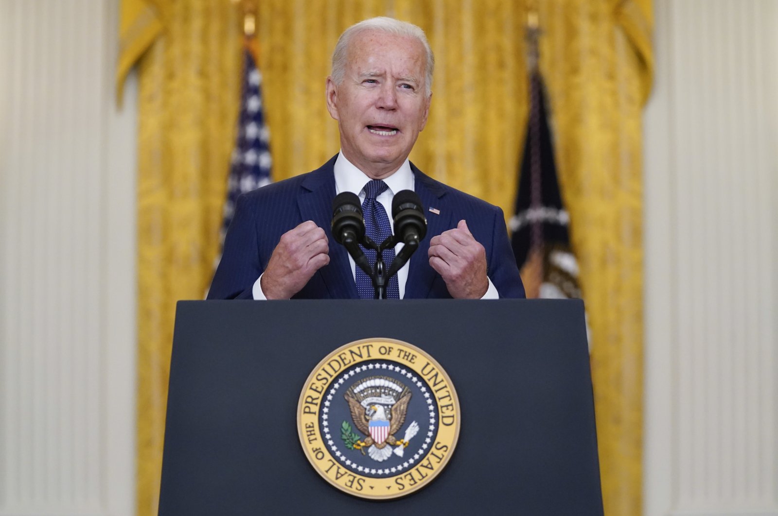 U.S. President Joe Biden speaks about the bombings at the Kabul airport that killed at least 12 U.S. service members, from the East Room of the White House, Washington, U.S., Aug. 26, 2021. (Photo by Evan Vucci via AP)