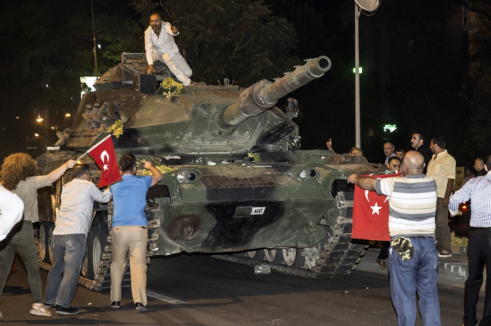 People confront a tank controlled by putschists during FETÖ's coup attempt in the capital Ankara, Turkey, July 15, 2016. (AA PHOTO) 
