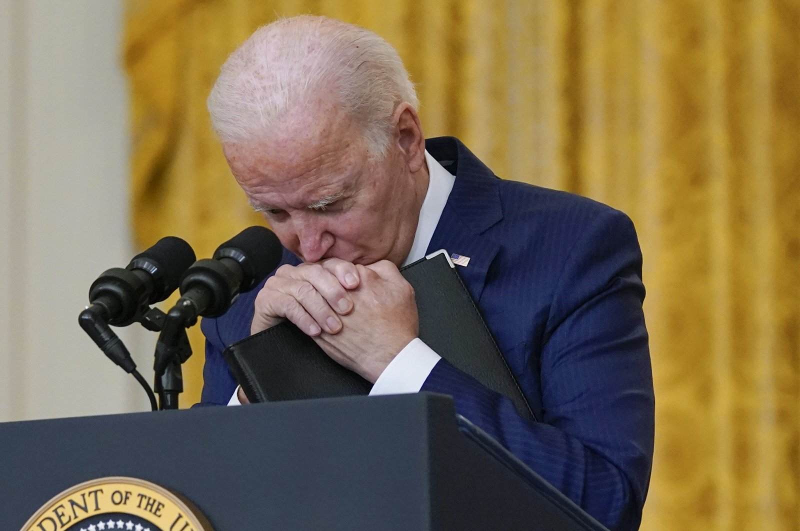 President Joe Biden pauses as he listens to a question about the bombings at Kabul Hamid Karzai International Airport that killed at least 12 U.S. service members, from the East Room of the White House, in Washington, D.C., U.S., Aug. 26, 2021.(AP Photo)