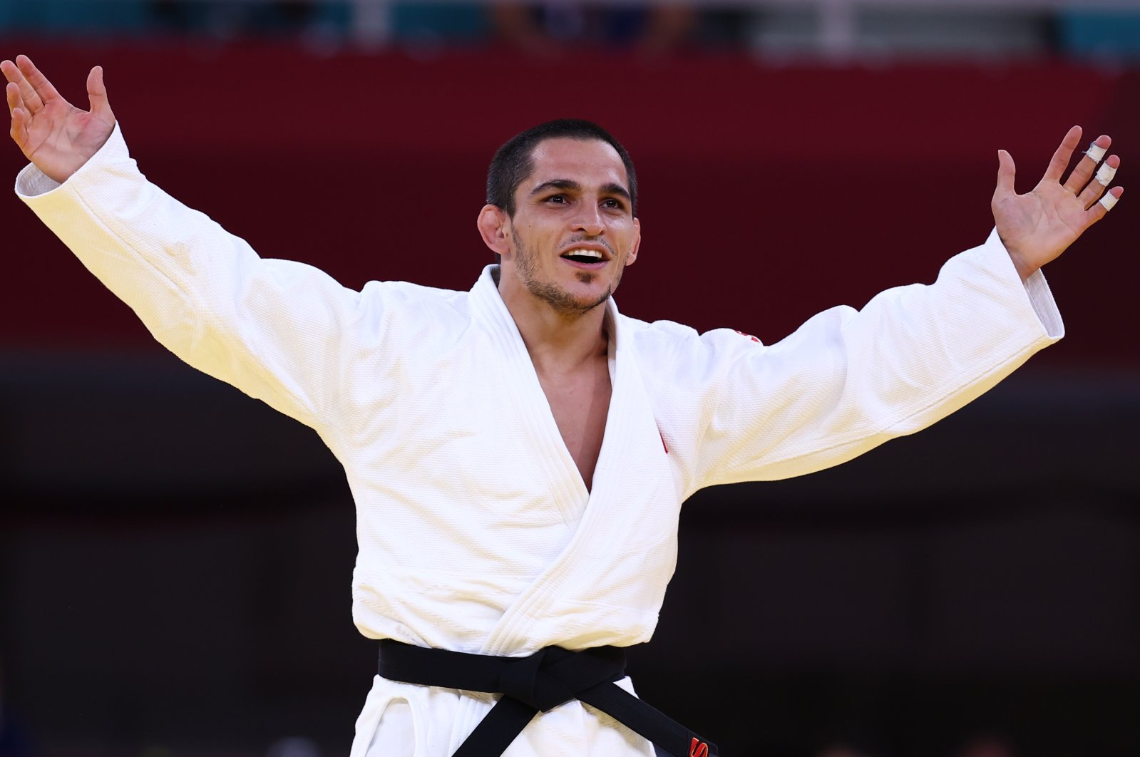 Turkish judoka Recep Çifçi celebrates after winning his match against Venezuela's Marcos Dennis Blanco at the Tokyo 2020 Paralympics, in Tokyo, Japan, Aug. 27, 2021. (Reuters Photo)
