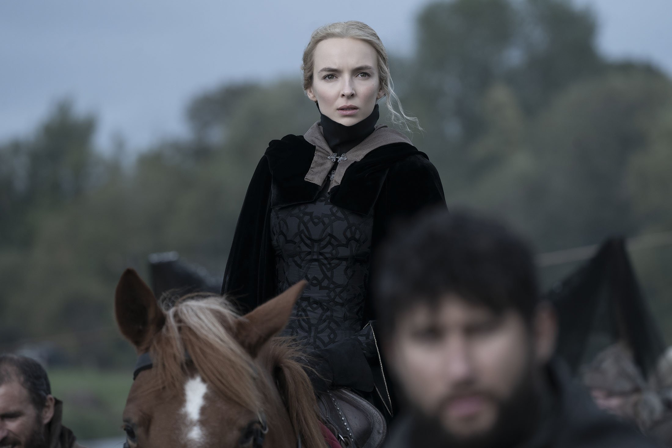 Jodie Comer as Marguerite de Carrouges rides a horse, in a scene from the film "The Last Duel." (20th Century Studios via AP)