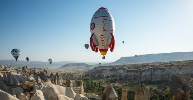 Hot air balloons fly above the Cappadocia region of Nevşehir province, central Turkey, Aug. 28, 2021. (AA Photo)