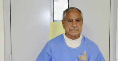 In this image provided by the California Department of Corrections and Rehabilitation, Sirhan Sirhan arrives for a parole hearing, San Diego, U.S., Aug. 27, 2021. (AP Photo)