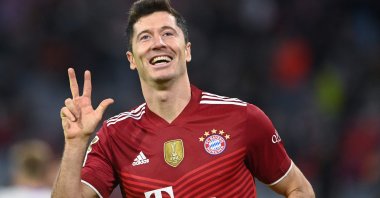 Bayern Munich's Polish forward Robert Lewandowski celebrates scoring his hat trick during the Bundesliga football match between FC Bayern Munich and Hertha BSC Berlin in Munich, southern Germany, Aug. 28, 2021. (AFP Photo)