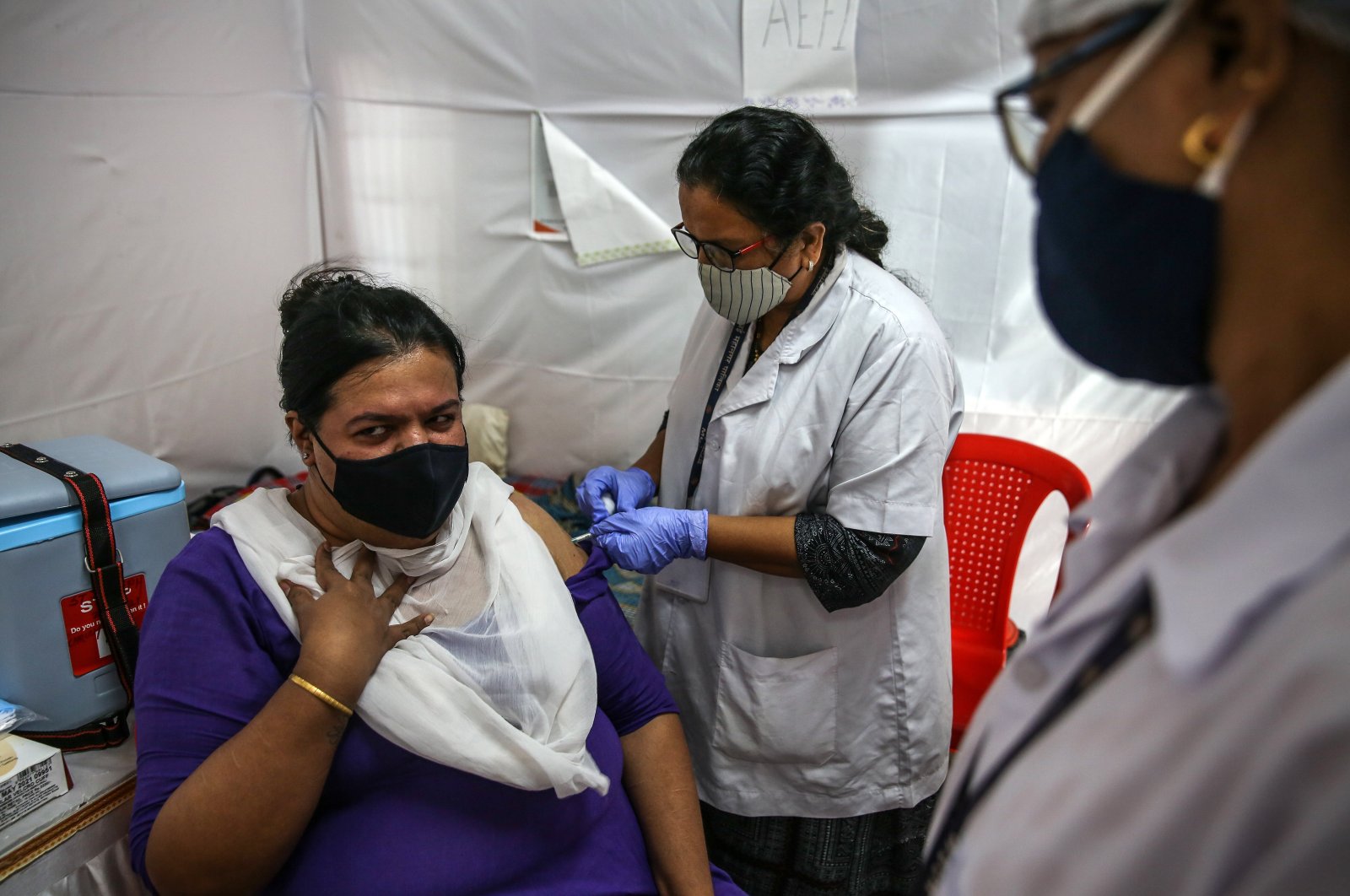 A person gets a dose of a COVID-19 vaccine at a vaccination center in Mumbai, India, Aug. 27, 2021. (EPA Photo)