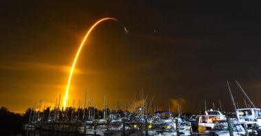 This long exposure photo shows the launch of a SpaceX Falcon 9 rocket on a resupply mission for NASA to the International Space Station from Pad 39A at Kennedy Space Center, seen from Merritt Island, Fla., U.S., Aug. 29, 2021. (AP Photo)