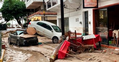 Damaged cars are pictured on a flooded street after Hurricane Nora pounds Mexico's coast with heavy rains and strong winds in Puerto Vallarta, in Jalisco state, Mexico, Aug. 29, 2021. (REUTERS Photo)