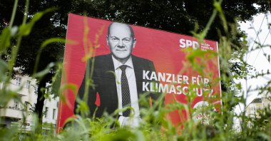 The SPD candidate for chancellor Olaf Scholz is displayed on an election campaign poster reading: “Chancellor for climate protection”, near a street in Berlin, Germany, Aug. 30, 2021. (AP Photo)
