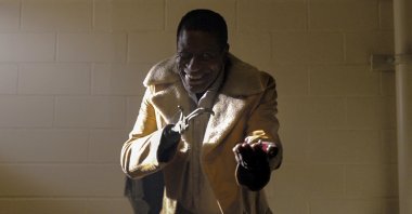 Michael Hargrove as Sherman Fields gestures, in a scene from the film "Candyman," directed by Nia DaCosta. (Universal Pictures via AP)