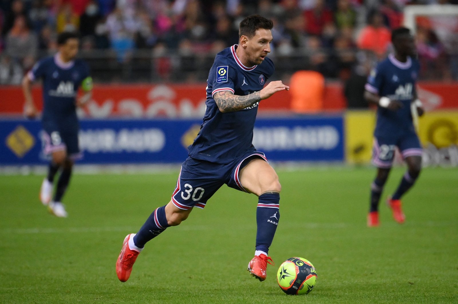 PSG's Lionel Messi runs with the ball during the French L1 match against Stade de Reims, northern France, Aug. 29, 2021. (AFP Photo)