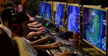 People play online games at an internet cafe in Fuyang, Anhui province, China, Aug. 20, 2018. (Reuters Photo)