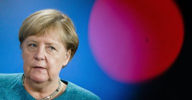 German Chancellor Angela Merkel looks on behind the red light of a TV camera during a joint press conference with Austrian Chancellor Kurz in Berlin, Germany, Aug. 31, 2021. (EPA Photo)