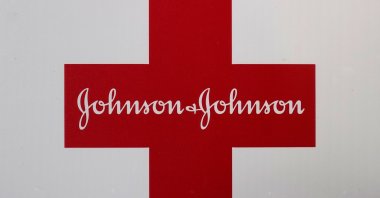 A Johnson & Johnson logo is seen on the exterior of a first aid kit in Walpole, Massachusetts, U.S., Feb. 24, 2021. (AP Photo)