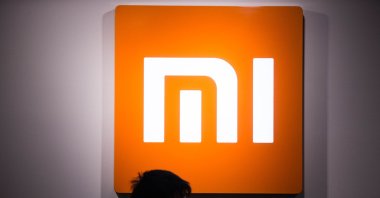 A Chinese customer visits a Xiaomi store in Hangzhou city, Zhejiang province, east China, on March 12, 2016. (Reuters)