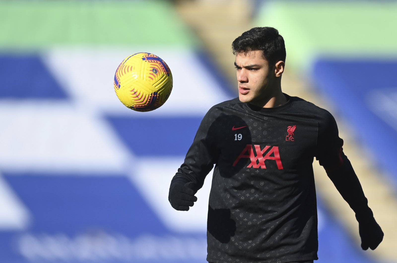 Liverpool's Ozan Kabak warms up ahead of the English Premier League match against Leicester City at the King Power Stadium in Leicester, England, Feb. 13, 2021. (AP Photo)