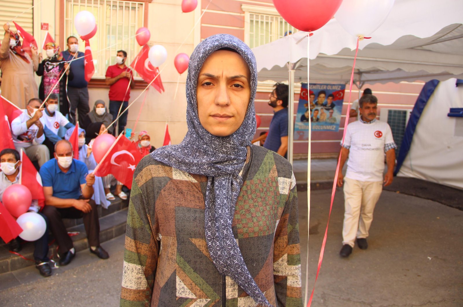 Mother Ayşegül Biçer speaks to journalists in front of HDP headquarters in Diyarbakir, Turkey, Aug. 31, 2021. (DHA Photo)