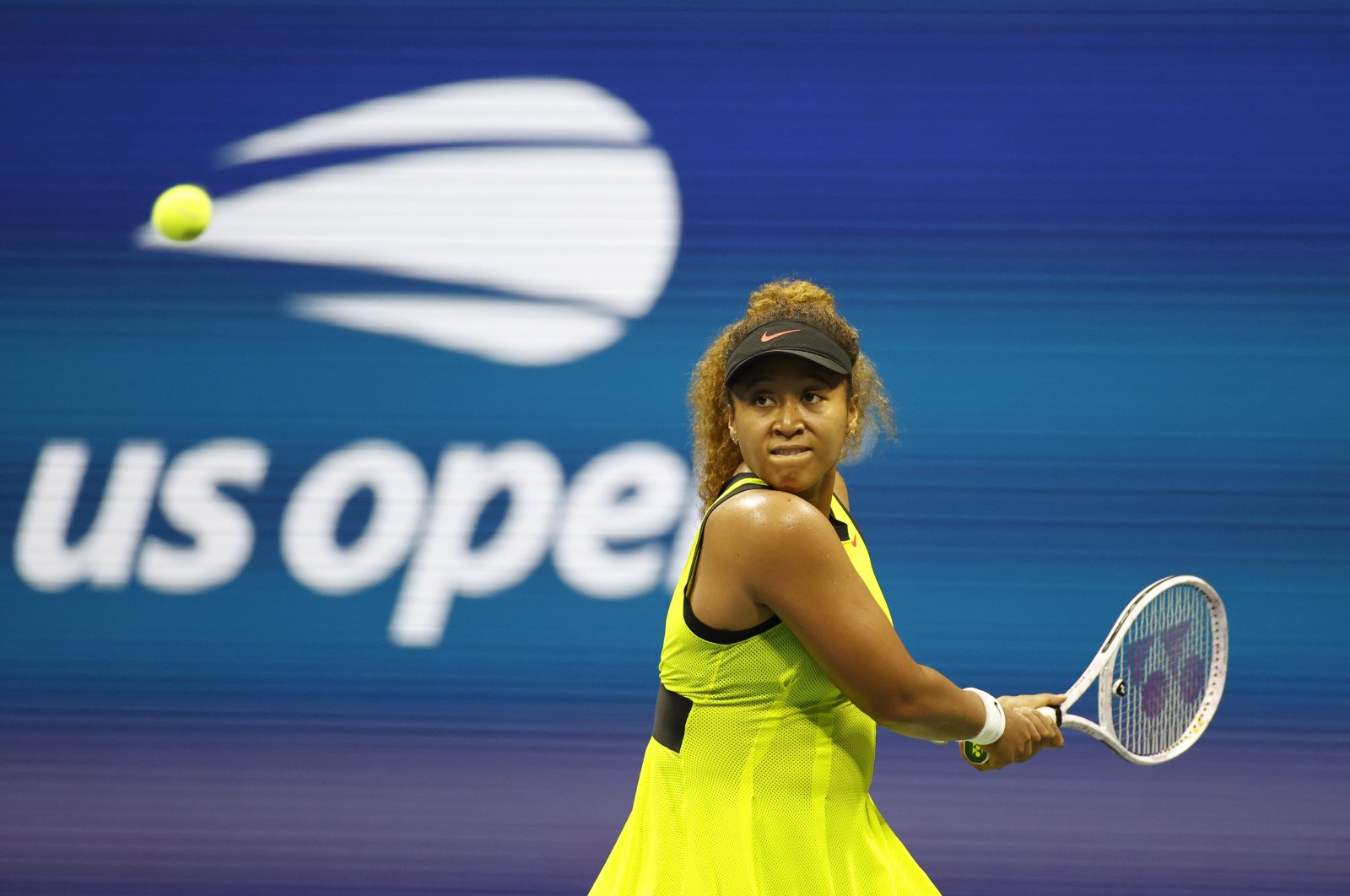 Japan's Naomi Osaka in action against the Czech Republic's Marie Bouzkova in the 2021 U.S. Open first round, New York, U.S., Aug. 30, 2021. (Reuters Photo)