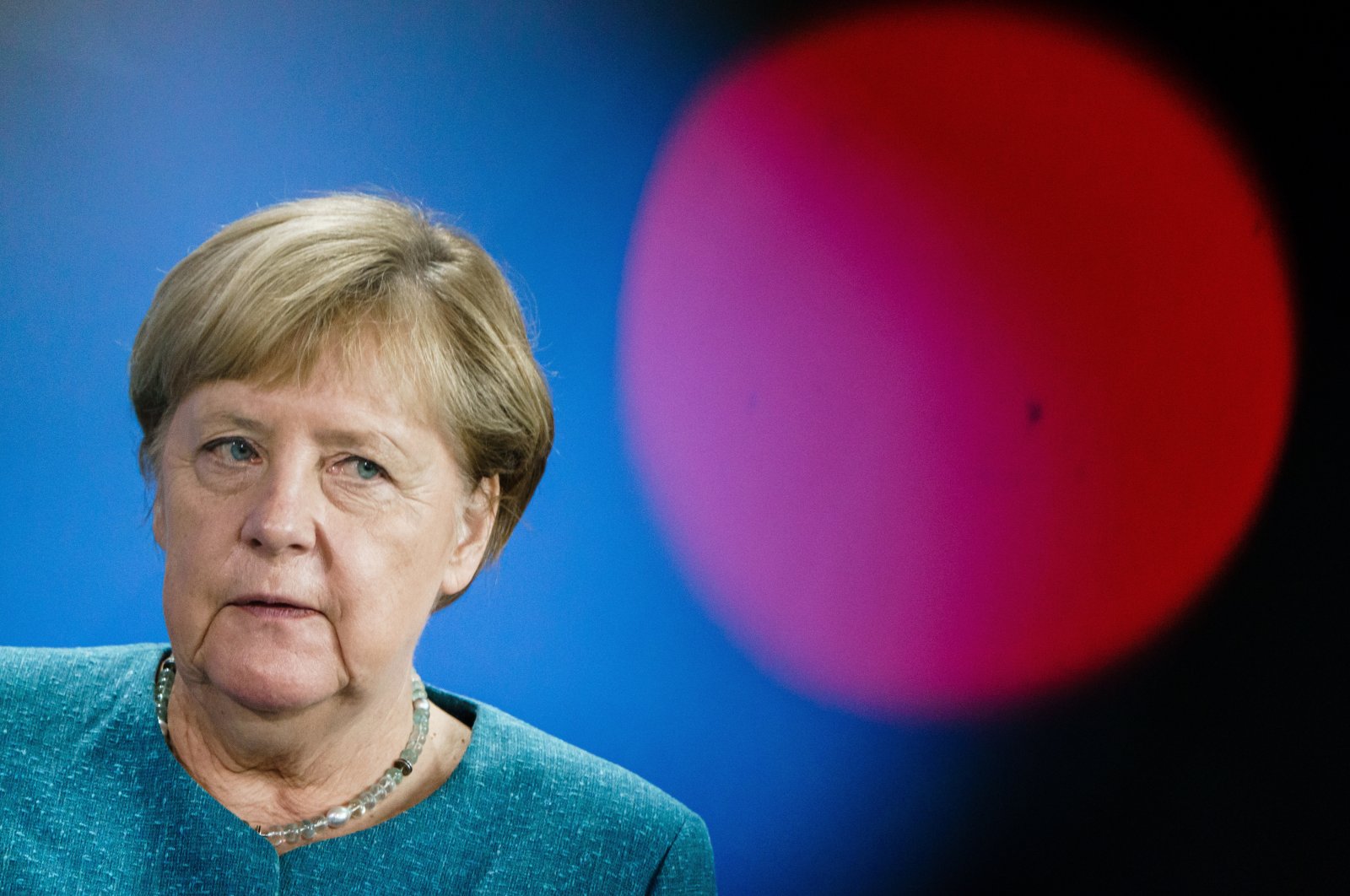 German Chancellor Angela Merkel looks on behind the red light of a TV camera during a joint press conference with Austrian Chancellor Kurz in Berlin, Germany, Aug. 31, 2021. (EPA Photo)