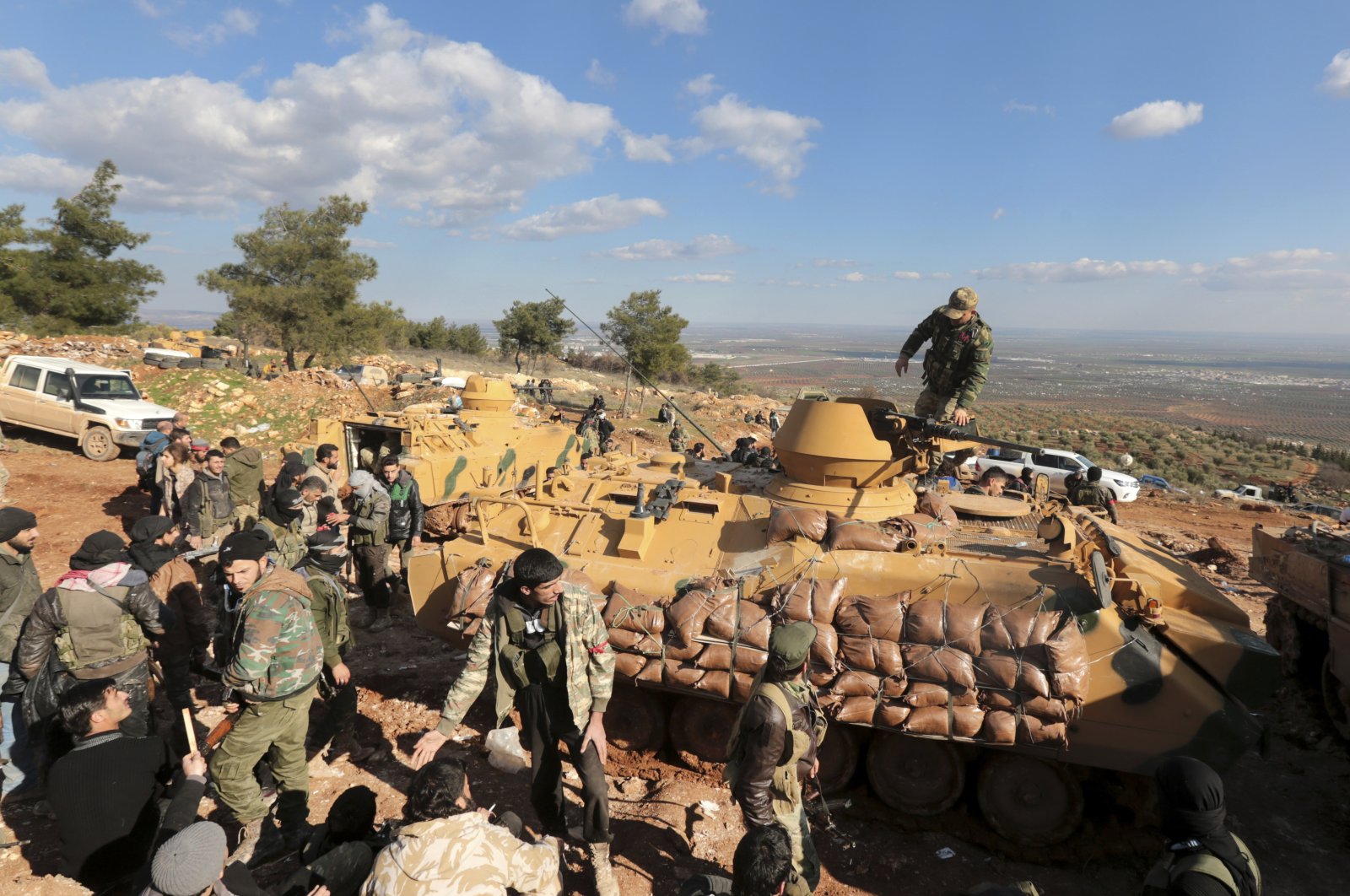 Turkish troops and Syrian fighters attempt to take control of Bursayah hill, which, at the time, had separated the YPG/PKK terrorist-held enclave of Afrin from the Turkish-controlled town of Azaz, Syria, Jan. 28, 2018. (AP File Photo)