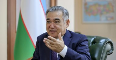 Uzbekistan's Ambassador to Ankara Alisher Agzamhadjaev gestures during an interview. (AA Photo)
