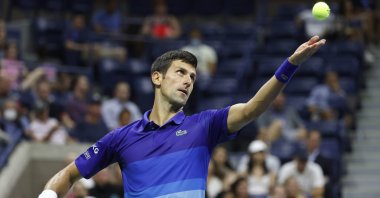 Serbia's Novak Djokovic serves against Denmark's Holger Vitus Nodskov Rune in their U.S. Open first-round match, New York, U.S., Aug. 31, 2021. (Reuters Photo)