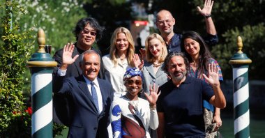 Members of the Venice Film Festival Jury, Bong Joon-ho, Saverio Costanzo, Virginie Efira, Cynthia Erivo, Sarah Gadon, Alexander Nanau, Chloe Zhao and Alberto Barbera pose for a photo, in Venice, Italy, Sept. 1, 2021. (Reuters Photo)