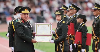 Lt. Müberra Öztürk receives her diploma from Chief of Staff Gen. Yaşar Güler in Istanbul, Turkey, Aug. 31, 2021.