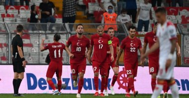 Turkey's midfielder Yusuf Yazici (L) celebrates with his teammates after scoring the second goal during the FIFA World Cup Qatar 2022 qualification Group G football match between Turkey and Montenegro at the Vodafone Park Stadium in Istanbul, Turkey, Sept. 1, 2021. (AFP Photo)