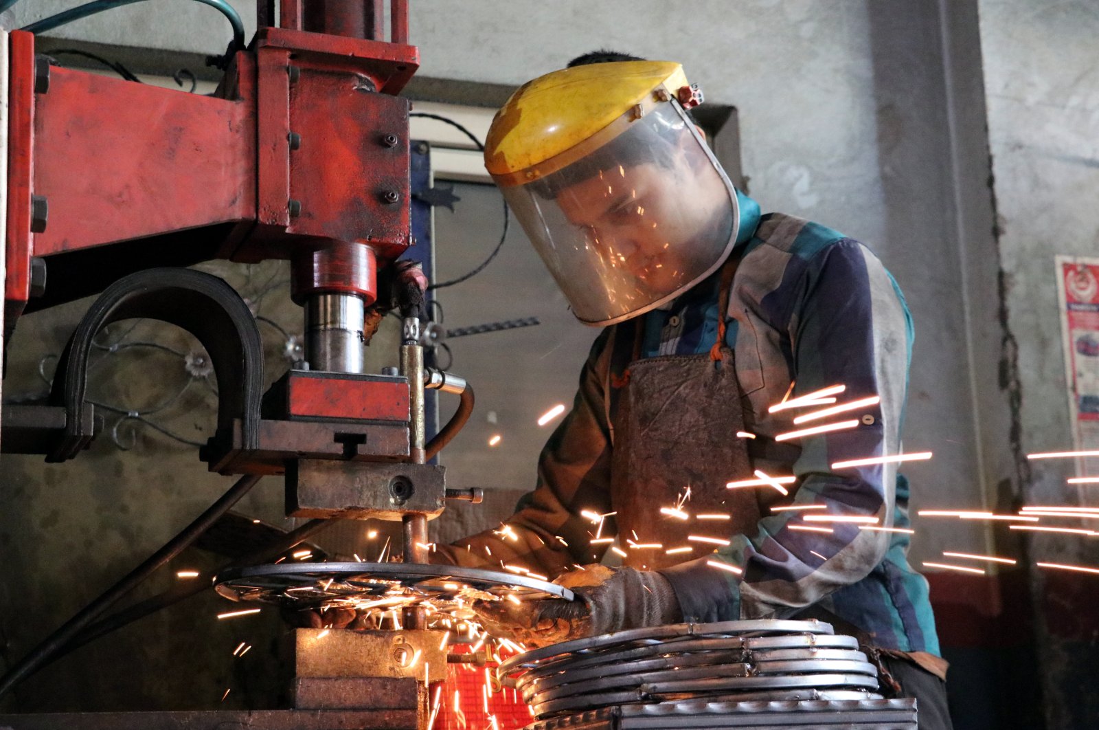 A worker is seen in a workshop in Gaziantep province, southeastern Turkey, Aug. 28, 2021. (AA Photo)
