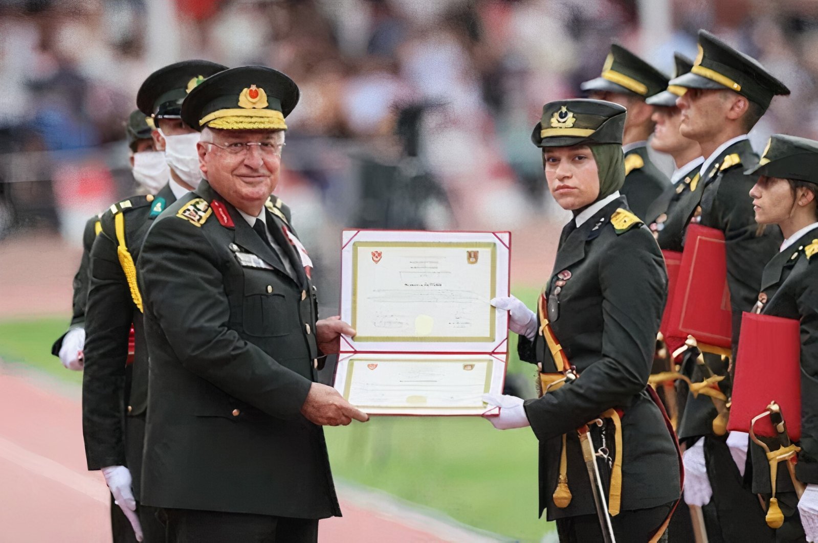 Lt. Müberra Öztürk receives her diploma from Chief of Staff Gen. Yaşar Güler in Istanbul, Turkey, Aug. 31, 2021.