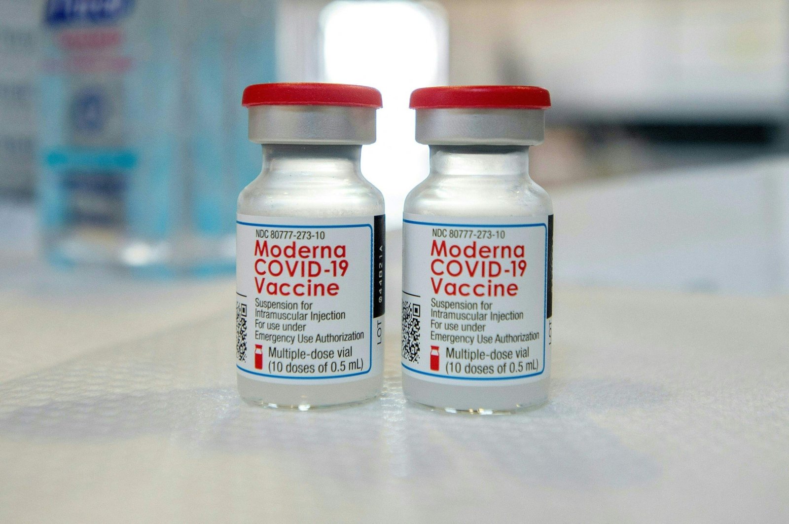 In this file photo Moderna vials sit on a table before they are loaded into syringes at a mobile COVID-19 vaccination clinic in Bridgeport, Connecticut, U.S., April 20, 2021. (AFP Photo)