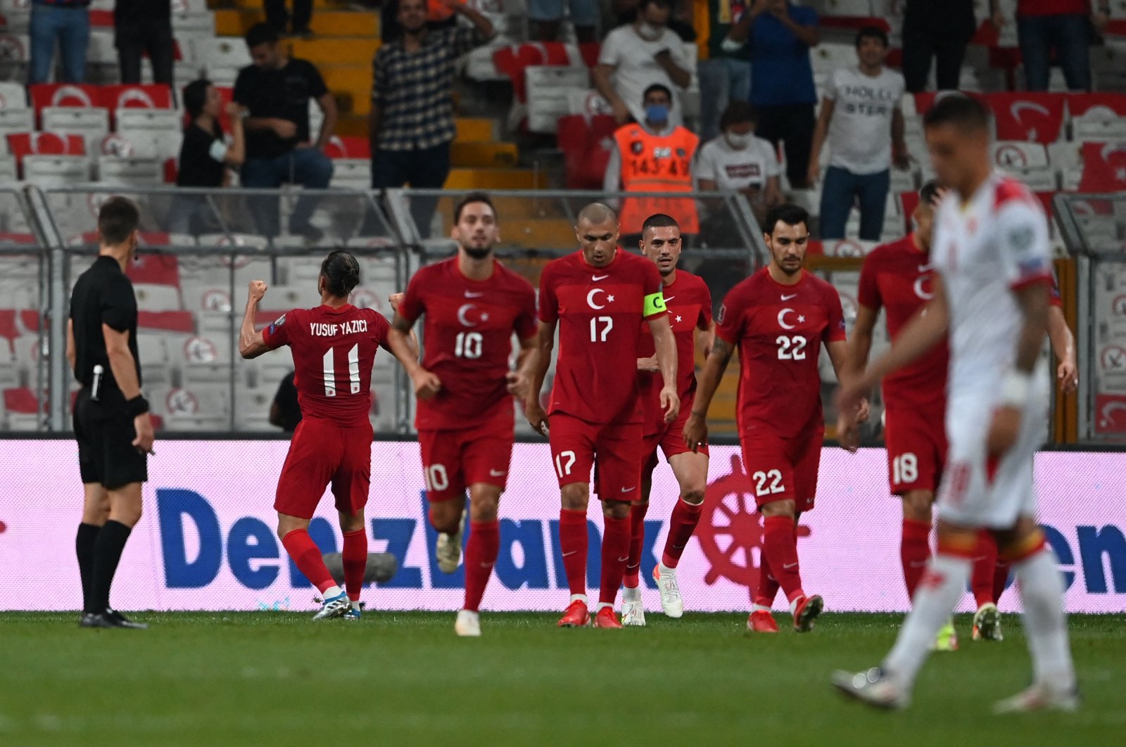 Turkey's midfielder Yusuf Yazici (L) celebrates with his teammates after scoring the second goal during the FIFA World Cup Qatar 2022 qualification Group G football match between Turkey and Montenegro at the Vodafone Park Stadium in Istanbul, Turkey, Sept. 1, 2021. (AFP Photo)