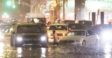 Cars are stuck on a street flooded by heavy rain as remnants of Hurricane Ida hit the area in the Queens borough of New York, New York, U.S., Sept. 1, 2021. (EPA Photo)