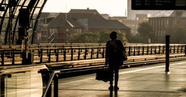 A passenger stands on an empty platform during the German Train Drivers' Union (GDL) strike at Berlin Central Railway Station in Berlin, Germany, Sept. 2, 2021. (EPA Photo)