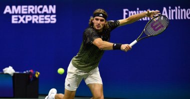 Greece's Stefanos Tsitsipas hits a return to France's Adrian Mannarino during their 2021 U.S. Open men's singles second-round match in New York, U.S., Sept. 1, 2021. (AFP Photo)