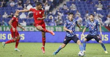 Oman's Issam al Sabhi scores against Japan in their World Cup Asian qualifiers match at the Panasonic Stadium, Suita, Japan, Sept. 2, 2021. (Reuters Photo)