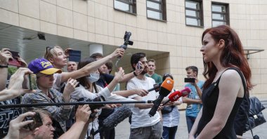 Alexei Navalny's spokesperson Kira Yarmysh (R) speaks to journalists while leaving the Preobrazhensky district court after a hearing in Moscow, Russia, Aug. 16, 2021. (EPA Photo / Maxim Shipenkov)