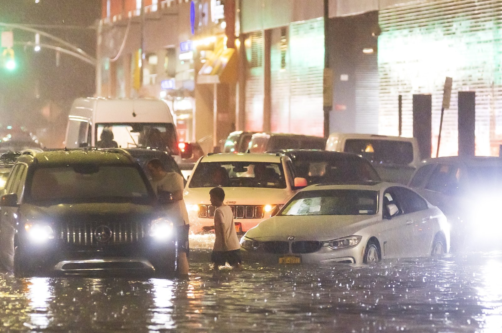 Cars are stuck on a street flooded by heavy rain as remnants of Hurricane Ida hit the area in the Queens borough of New York, New York, U.S., Sept. 1, 2021. (EPA Photo)