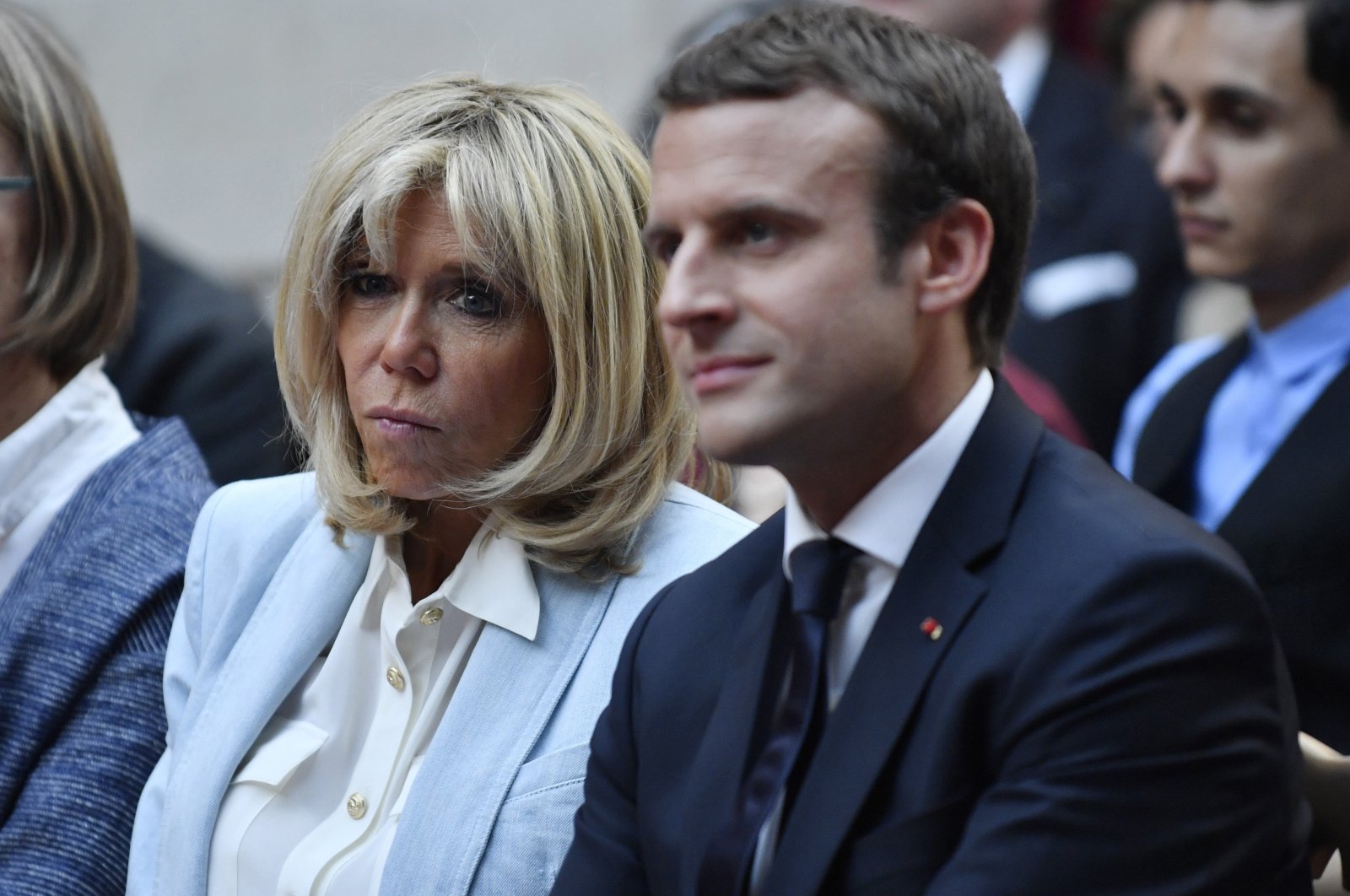 French First Lady Brigitte Macron and French President Emmanuel Macron attend a concert from the Pierre Claver Association at the Elysee Palace in Paris, France, on July 25, 2017. (AP Photo)