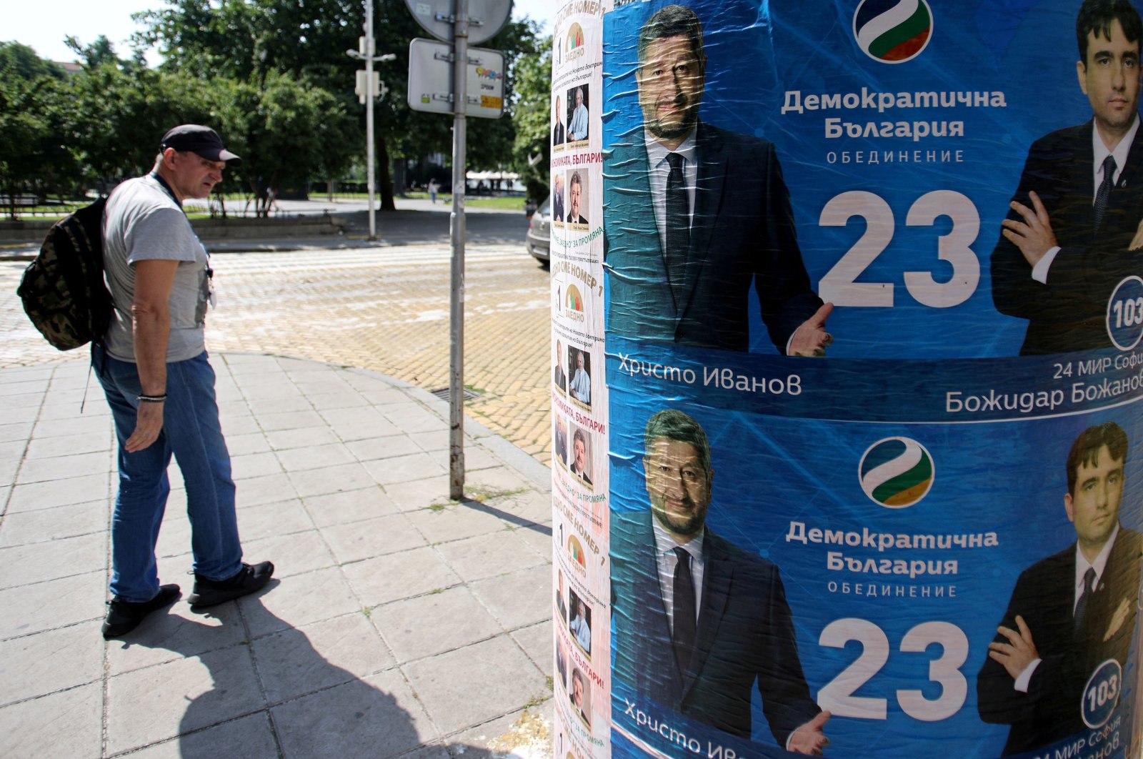 A man walks past election posters of the Democratic Bulgaria party in Sofia, Bulgaria, July 8, 2021. (Reuters Photo)