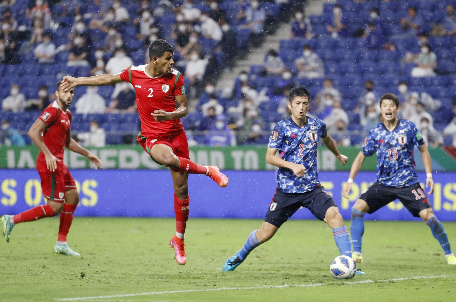 Oman's Issam al Sabhi scores against Japan in their World Cup Asian qualifiers match at the Panasonic Stadium, Suita, Japan, Sept. 2, 2021. (Reuters Photo)