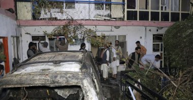 Afghan people are seen inside a house after U.S. drone strike in Kabul, Afghanistan, Aug. 29, 2021. (AP Photo)