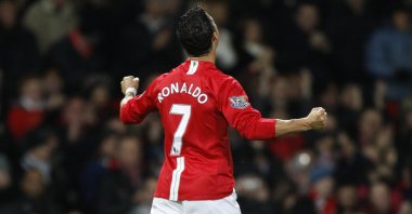 Manchester United's Cristiano Ronaldo celebrates after scoring against West Ham in a Premier League match at Old Trafford Stadium, Manchester, England, Oct. 29, 2008. (AP Photo)