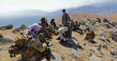 Afghan resistance movement and anti-Taliban uprising forces take rest as they patrol on a hilltop in Darband area in Anaba district, Panjshir province, Afghanistan, Sept. 1, 2021. (AFP Photo)
