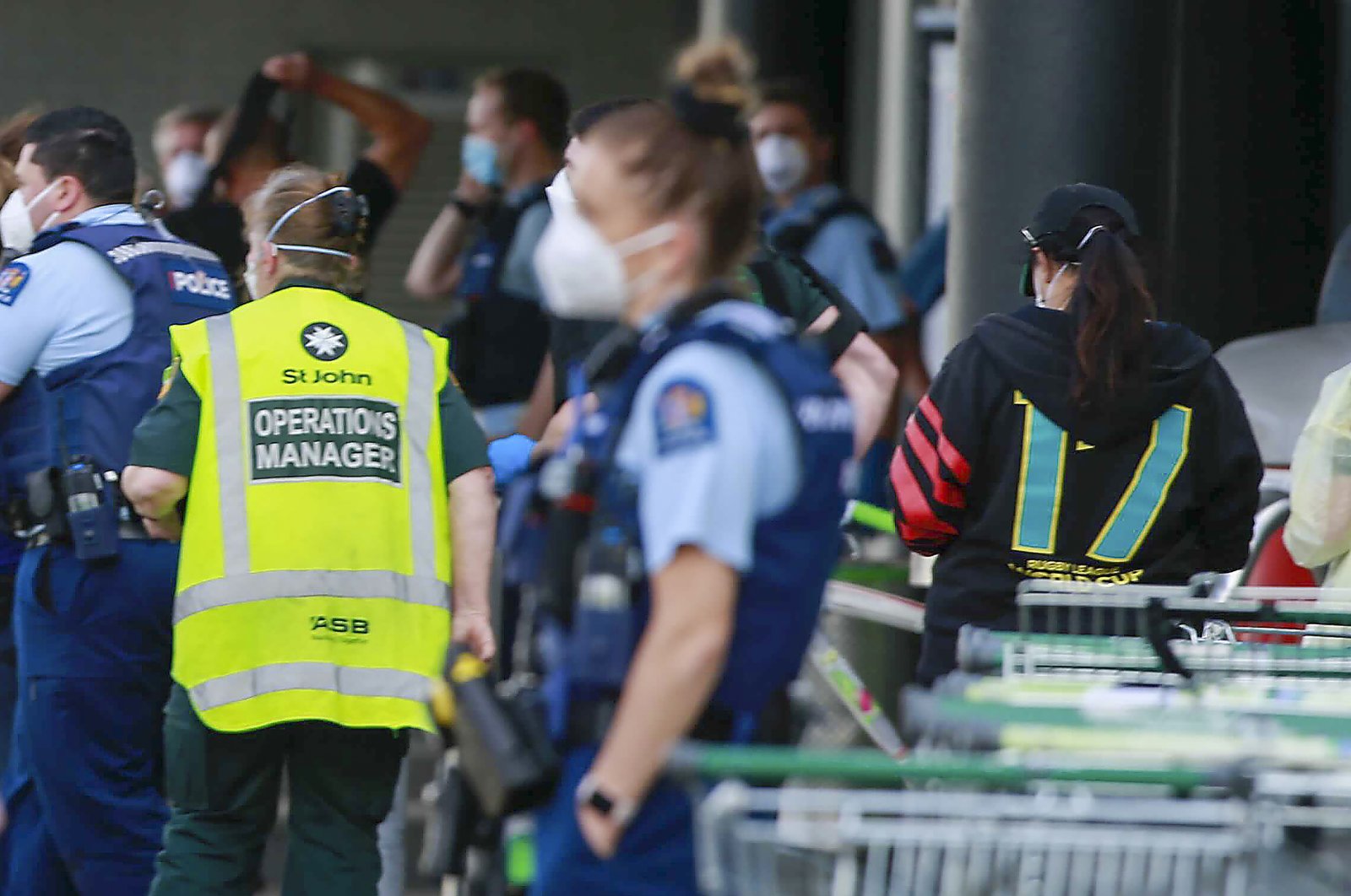 Police and ambulance staff attend a scene outside an Auckland supermarket, New Zealand, Sep. 3, 2021. (AP Photo)