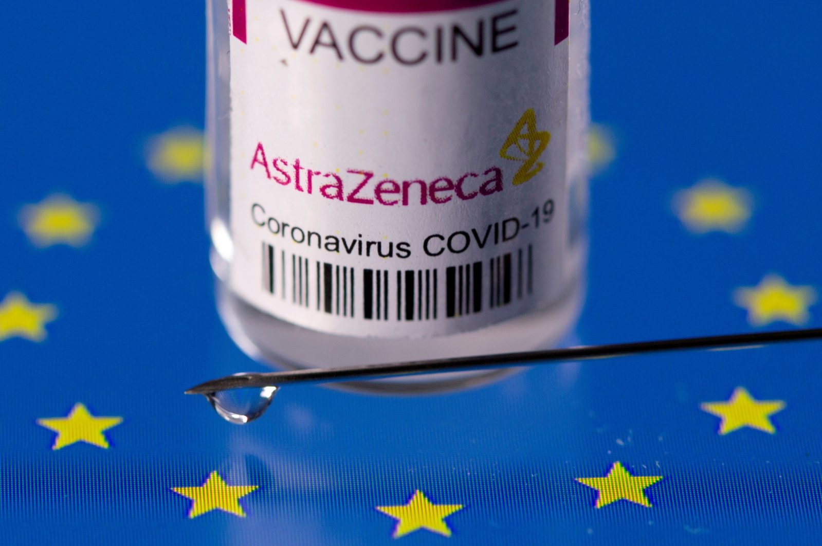 A vial labeled "AstraZeneca COVID-19 vaccine" placed on an EU flag is seen in this illustration picture taken on March 24, 2021. (Reuters Photo)