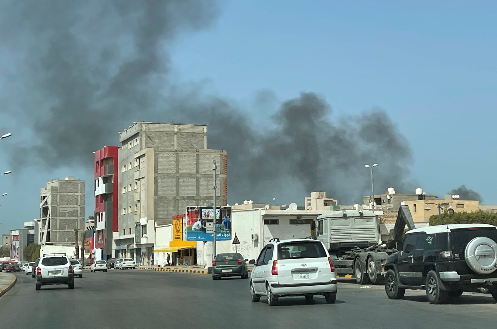 Smoke rises after an attack on the Administrative Control Authority in Tripoli, Libya, August 31, 2021. REUTERS/Hazem Ahmed/File Photo