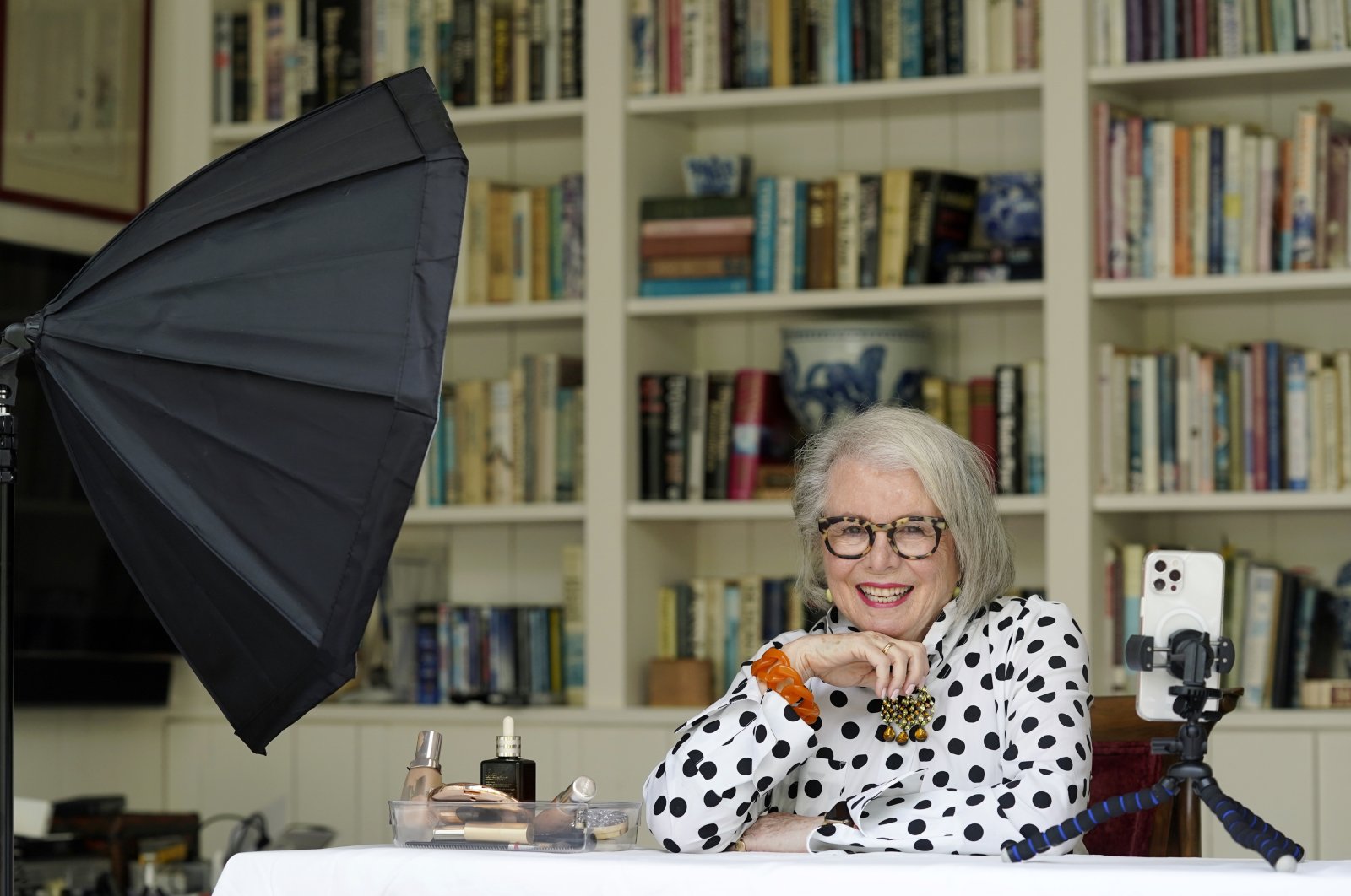 Senior influencer Sandra Sallin, 80, poses for a portrait at home, in Los Angeles, U.S., Aug. 20, 2021. (AP Photo)