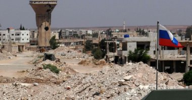 A picture shows a Russian flag on a Russian military vehicle in the Syrian district of Daraa al-Balad, Syria, Sept. 1, 2021.  (AFP Photo)